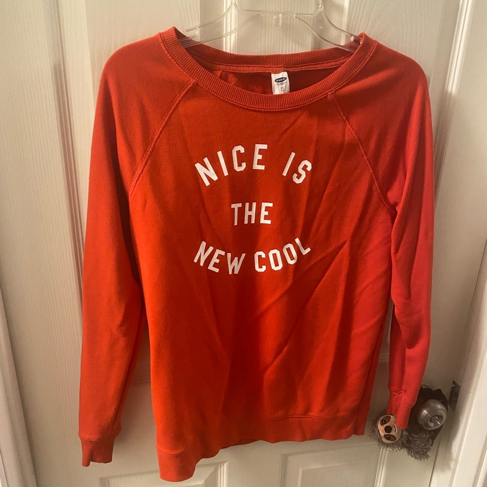 This is an Old Navy Orangeish-Red Long sleeve shirt. It is an XS